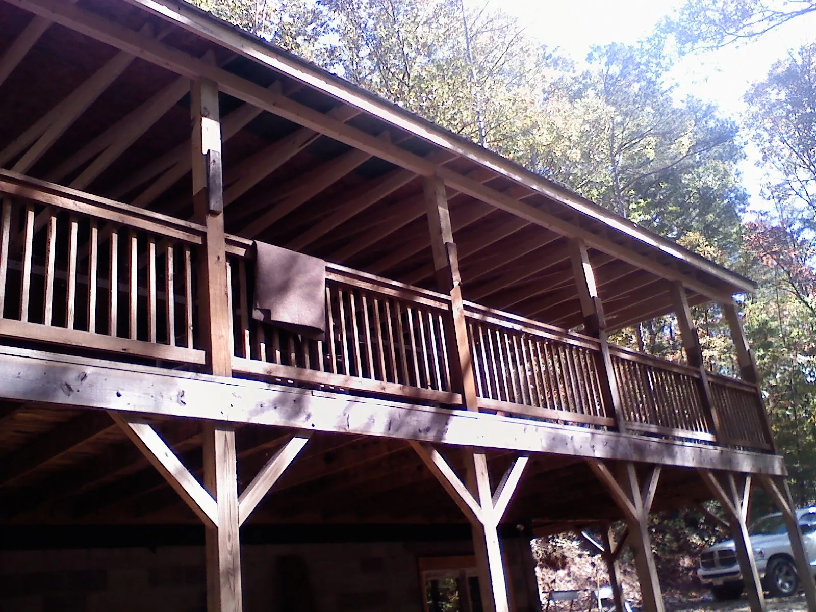 Timber framing under a new elevated porch and deck — Roof Leak Repair in Union Springs by Roofing Brothers